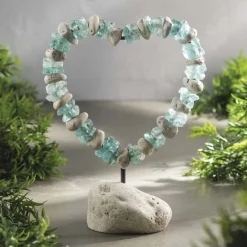 Glass And Stone Heart On The Rocks
