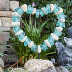 Glass And Stone Heart On The Rocks