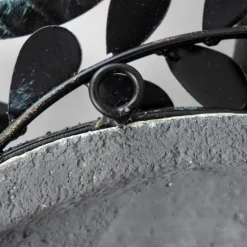 Metal Leaf Sun Face Wall Art